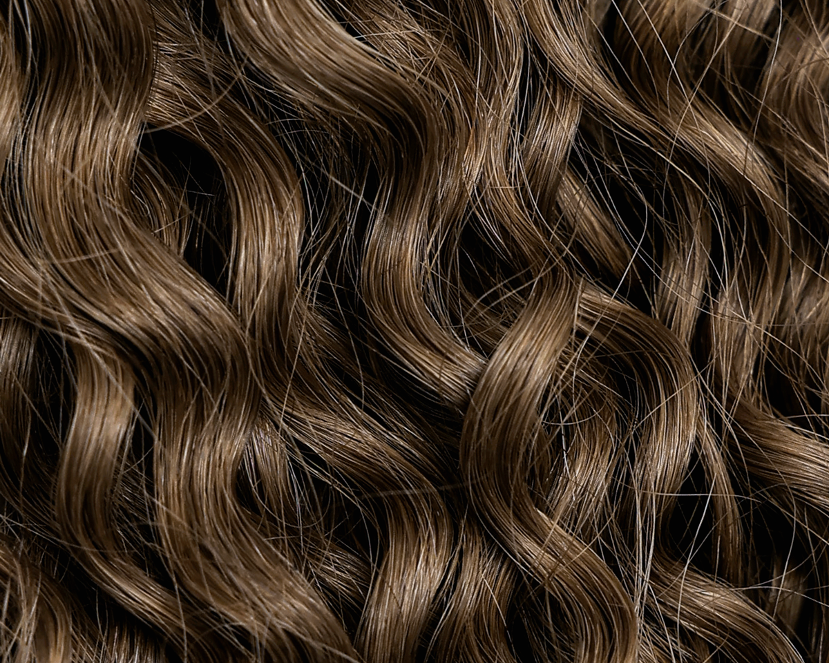 The Truth About Curly Extensions: More Product Isn’t Better